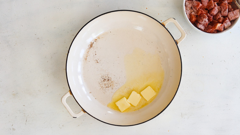 butter heated in a pan