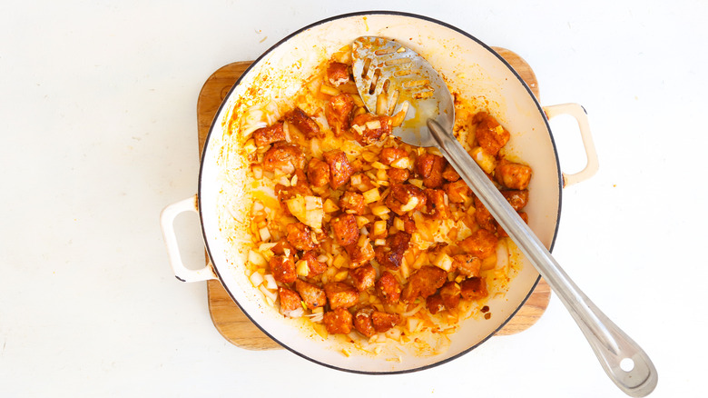 cooked onion and garlic in a pan