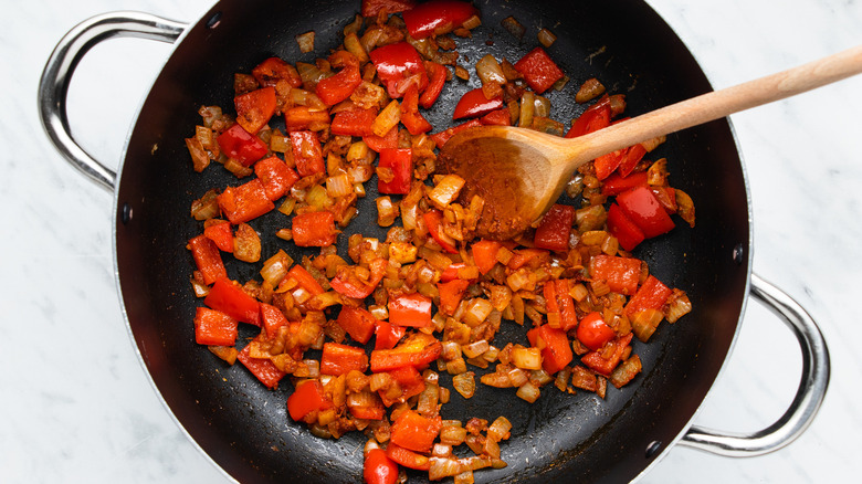 veggies and spices in pan 