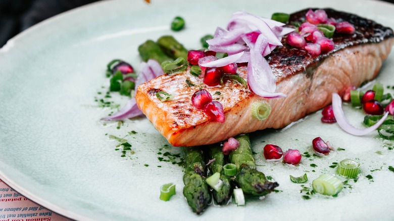 Asparagus with Seared Salmon, Red Onion, and Pomegranate Seeds