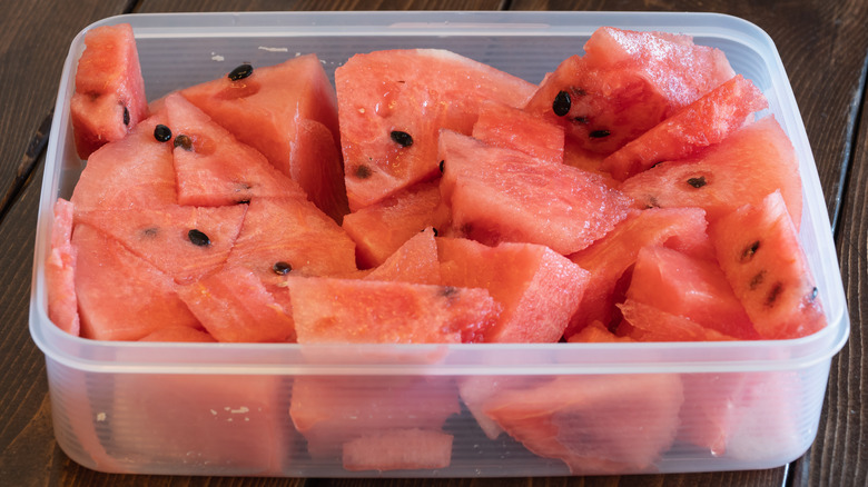 Sliced watermelon in plastic container 