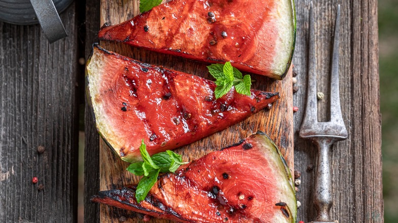 Grilled watermelon on a cutting board