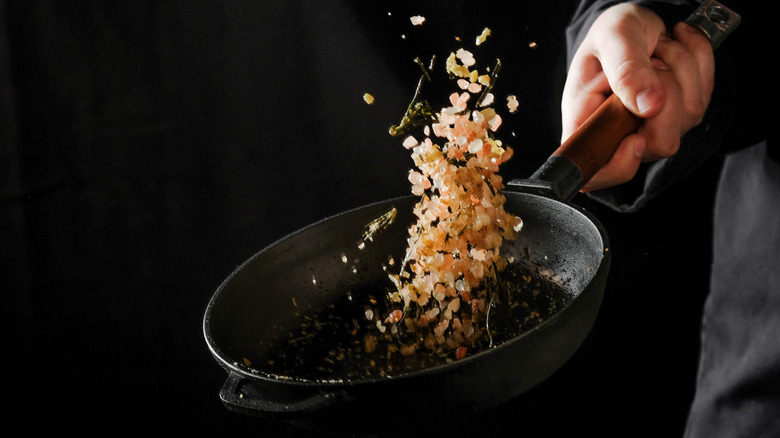 Cooking roasted spices in a pan