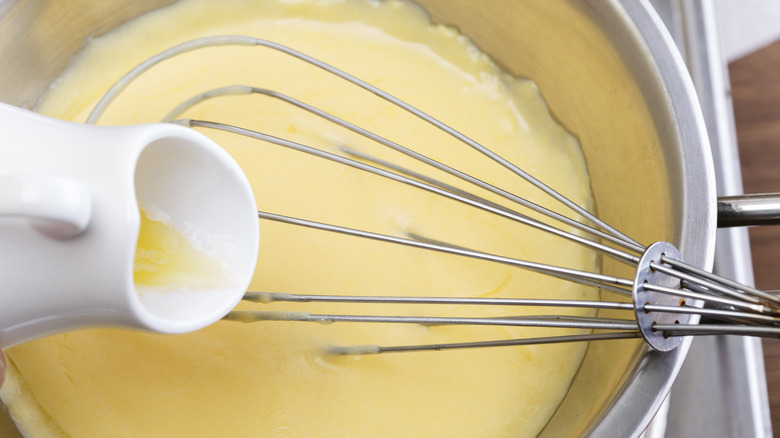 Whisking hollandaise in bowl