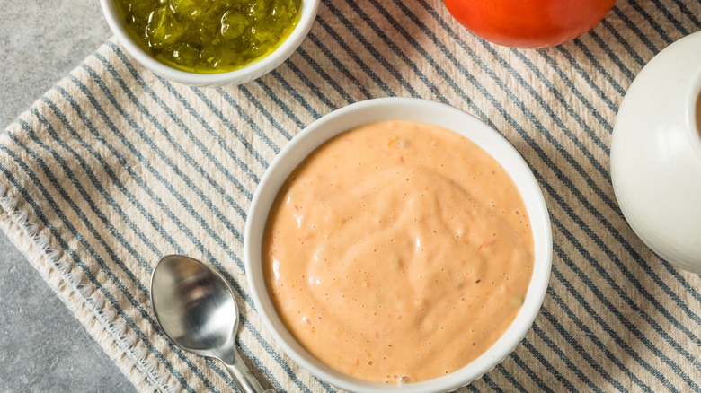 Bowl of orange and green sauce