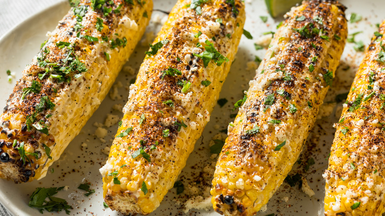 Corn with shredded cheese and herbs