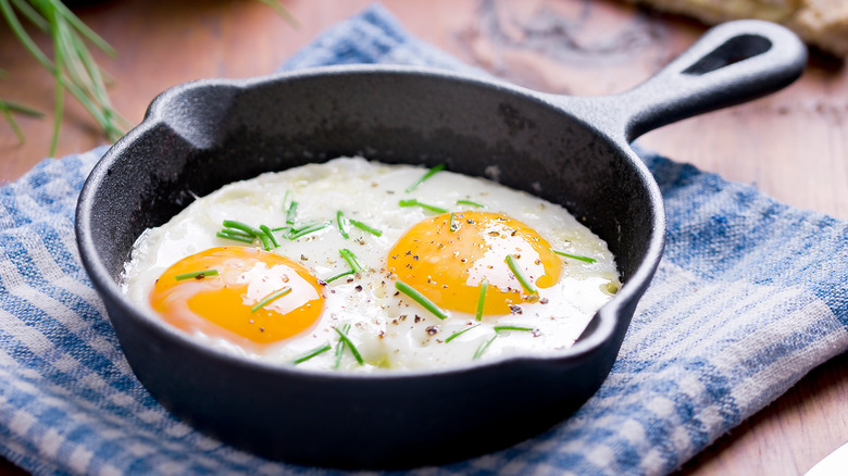 fried eggs in a pan