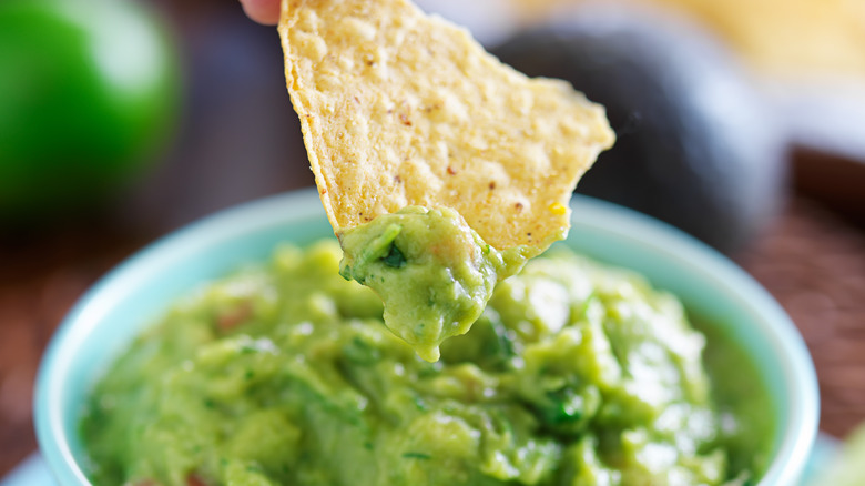 Chip dipped into guacamole 