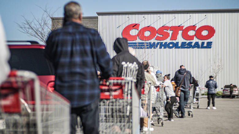 People lining up outside of Costco