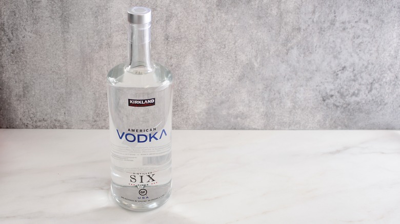 Bottle of Kirkland Signature vodka on a marble table