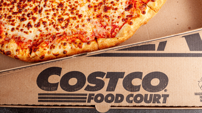 Costco cheese pizza in cardboard Costco food court box