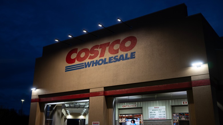 Exterior of Costco warehouse at nighttime