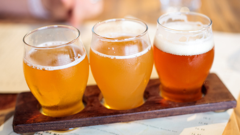 A flight of colorful beers