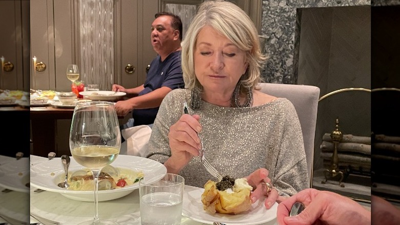 Martha Stewart enjoying a smashed baked potato with caviar