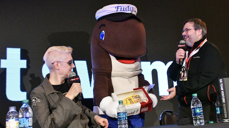 Fudgie the Whale mascot onstage 