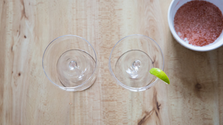 Empty margarita glasses on table