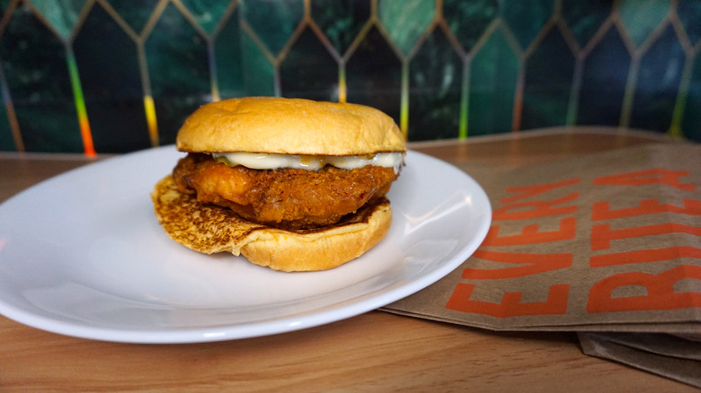 A Smashburger on white plate