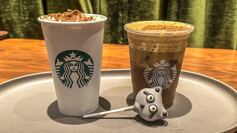 Two Starbucks beverages and cake pop