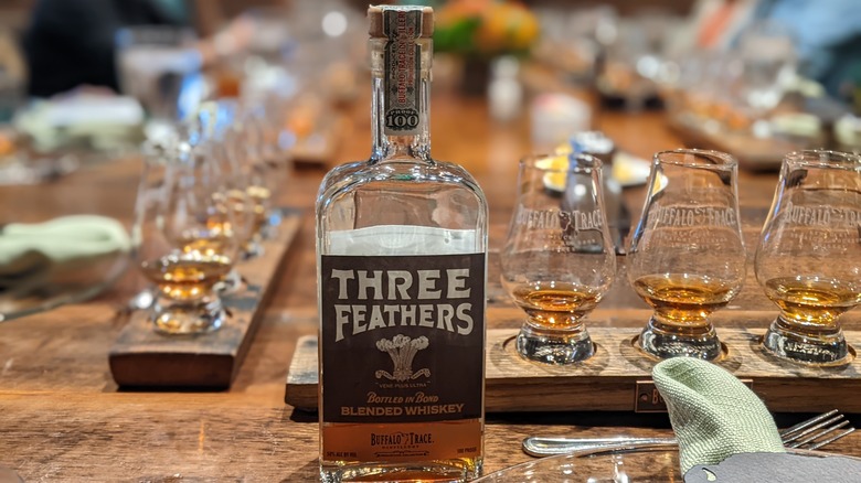 Three Feathers whiskey bottle