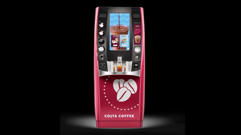 Costa Coffee Smart Cafe machine on black background