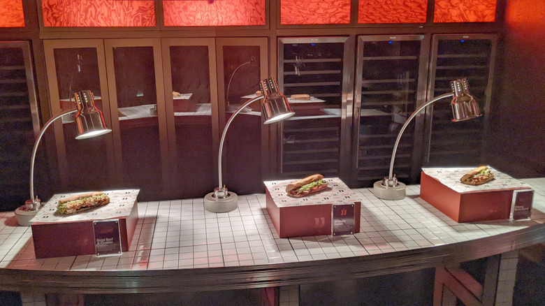 Jimmy John's toasted sandwiches under heat lamps