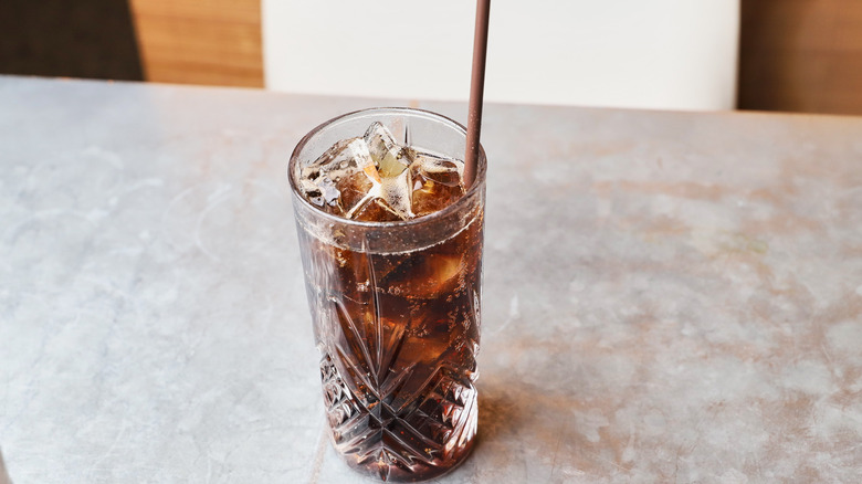 Cola in glass with ice