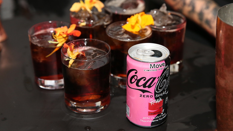 Coke Move beside cocktails