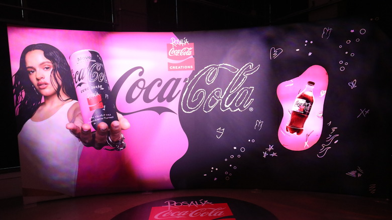 Poster of Rosalía holding Coca-Cola