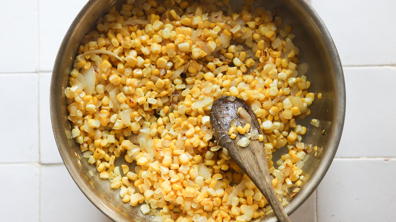 corn and spoon in pot