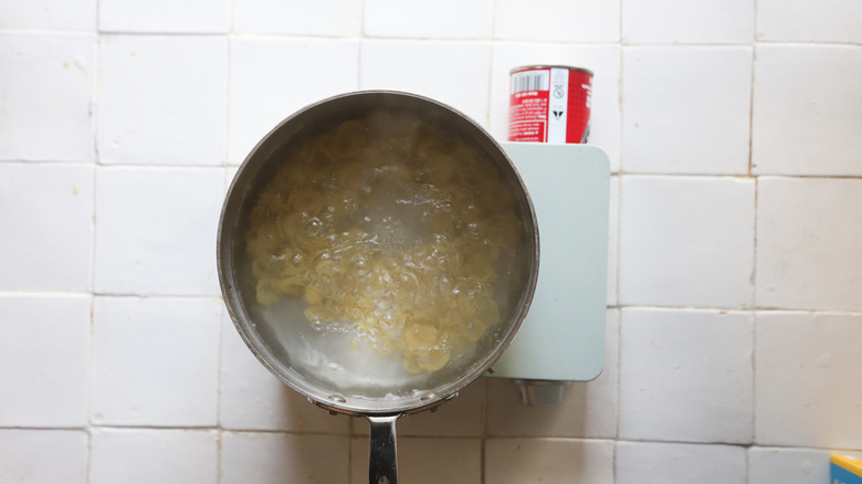 Pot boiling orechiette pasta