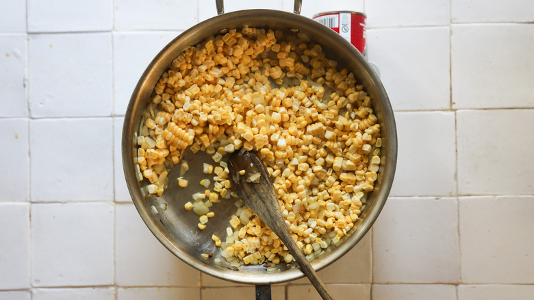 Corn sauteing in pan