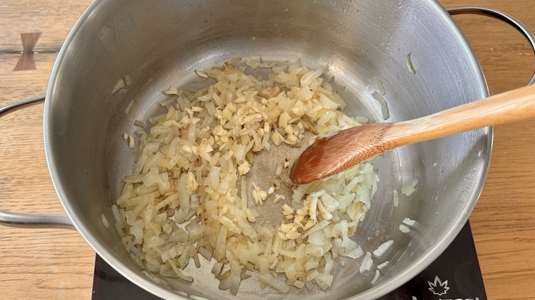 onion garlic sauteeing in pot