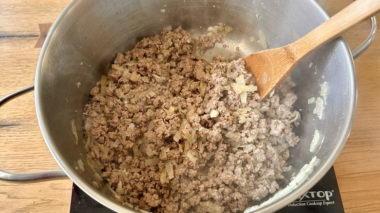 ground turkey sauteeing in pot