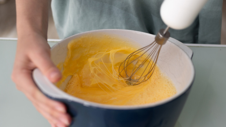 Whisking eggs with an immersion blender