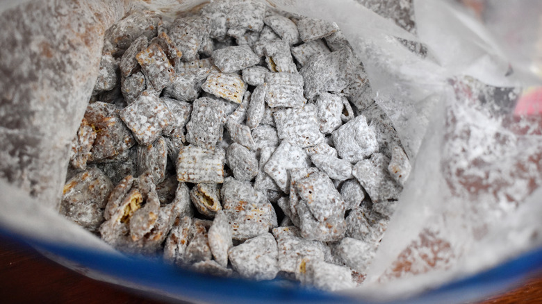 Puppy Chow in a plastic bag.