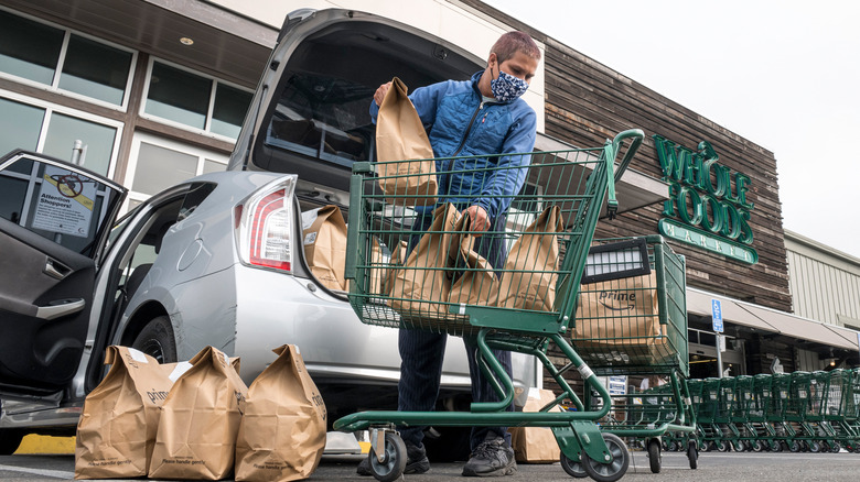 loading Whole Foods grocery bags