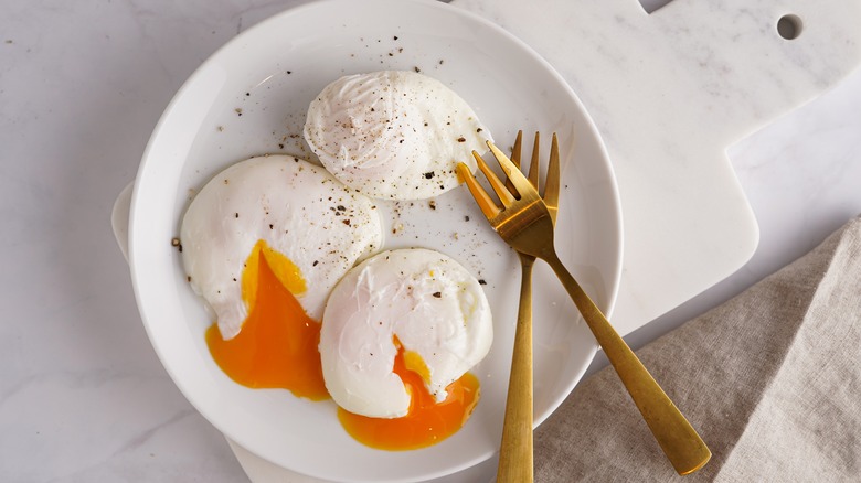 Poached eggs golden yolk