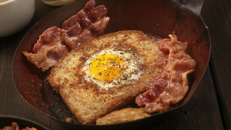 egg in a hole with bacon