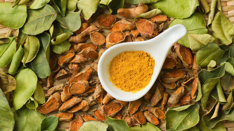 curry ingredients with makrut lime leaves