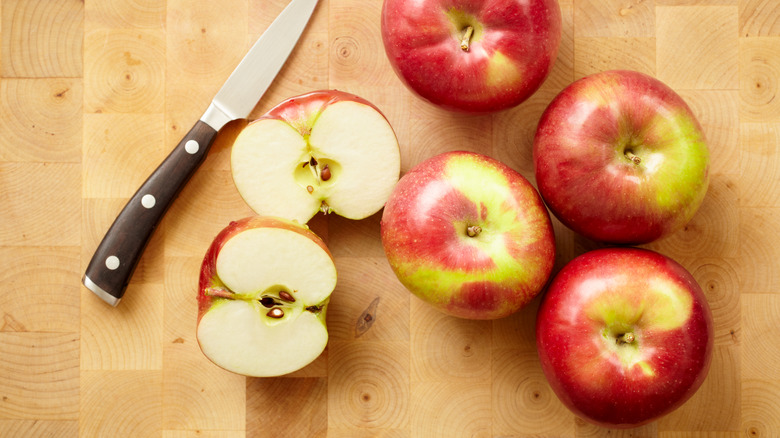 whole and cut apples