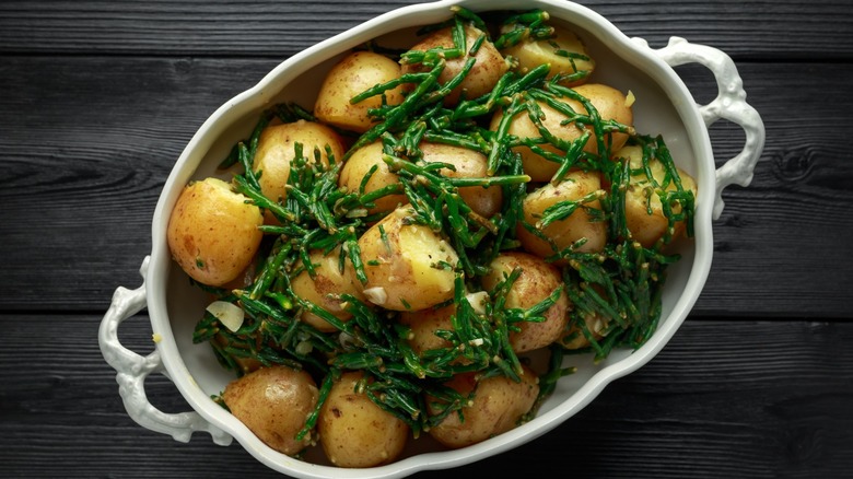 Cooked sea beans with potatoes in a dish