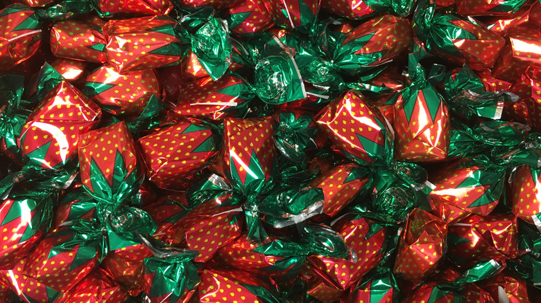 Many wrapped strawberry candies