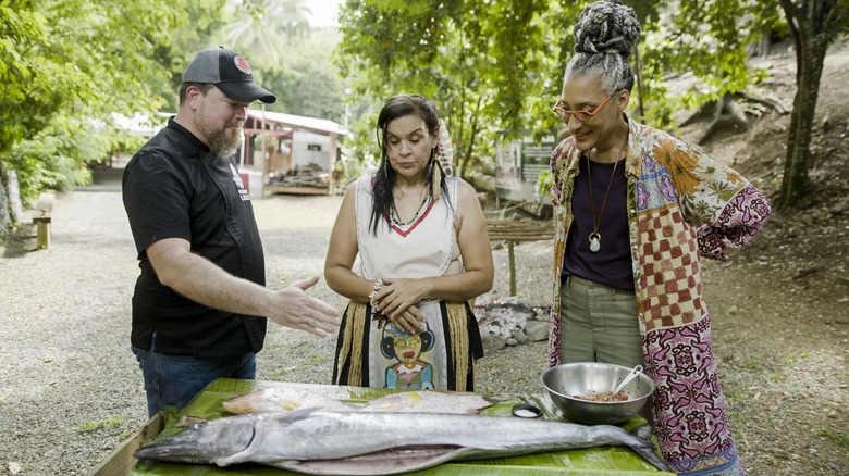 Carla Hall and couple prepping fish