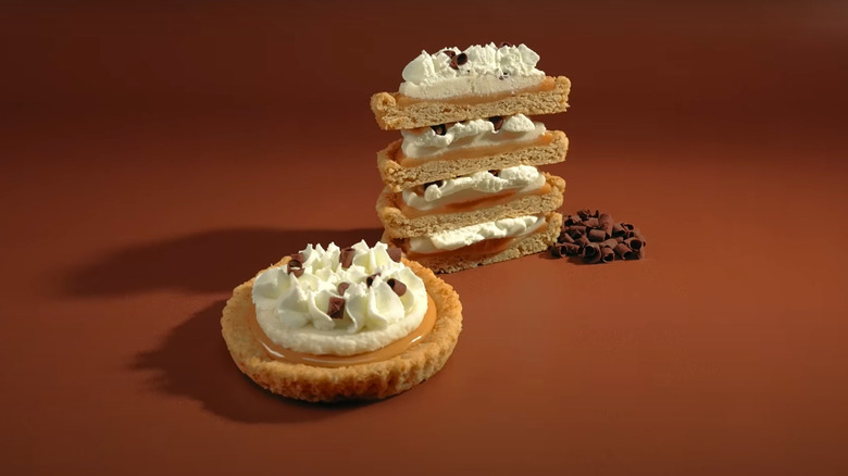 banoffee pie cookies from Crumbl on brown background