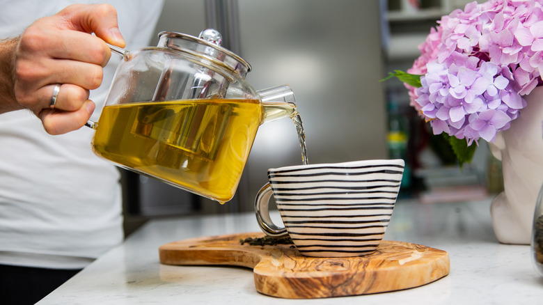 Person making tea at home