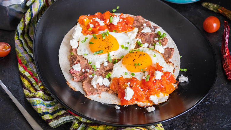 Huevos rancheros in plate