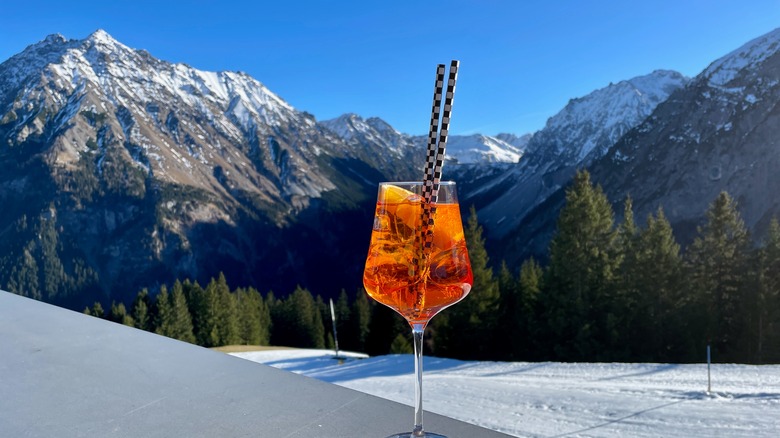 cocktail in front of mountains