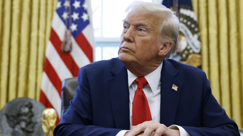 United States President Donald Trump looking to the side