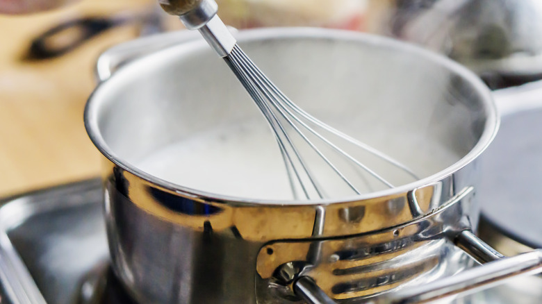 Milk in a pot on stovetop