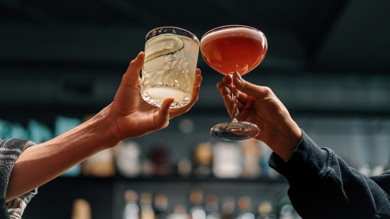 revelers toasting cocktails